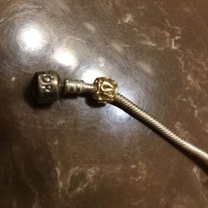 Pandora 8” bracelet with one charm and 2 spacers